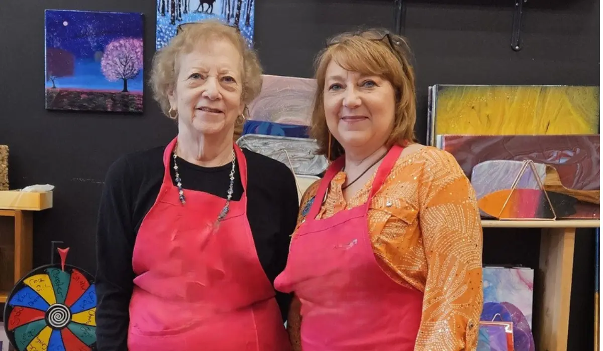 People creating fluid art paintings at Hangout for Art studio in Allentown near Dorney Park